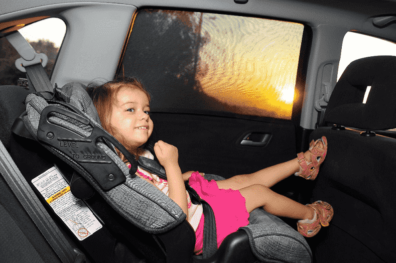 Criança em carro - Cocoa Beach